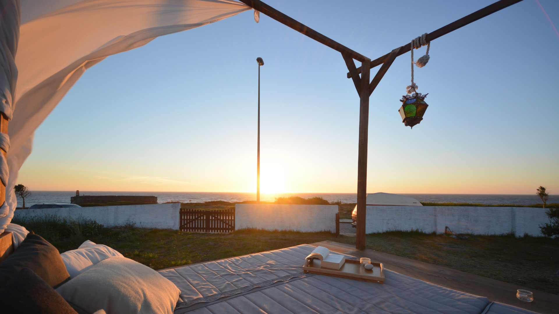 Goodtimes Sportreisen Surfcamp Portugal Blick von Terasse auf Sonnenuntergang